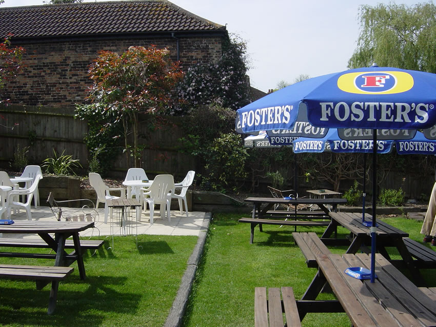 Seating and tables in Riverside Lawn Garden - The Old Crown Public House Weybridge Elmbridge